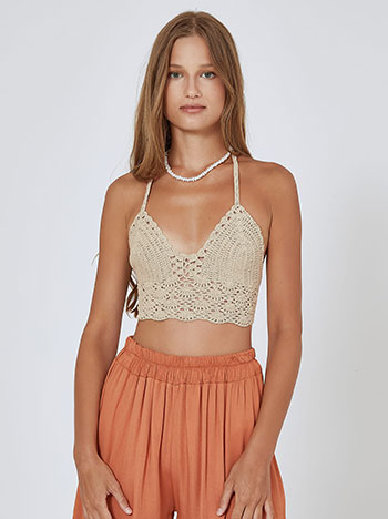 Knitted crop top with perforated details in beige