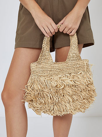 Handmade shoulder bag from natural raffi materials in light beige