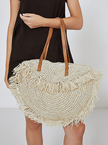 Handmade bag with natural raffi materials in light beige