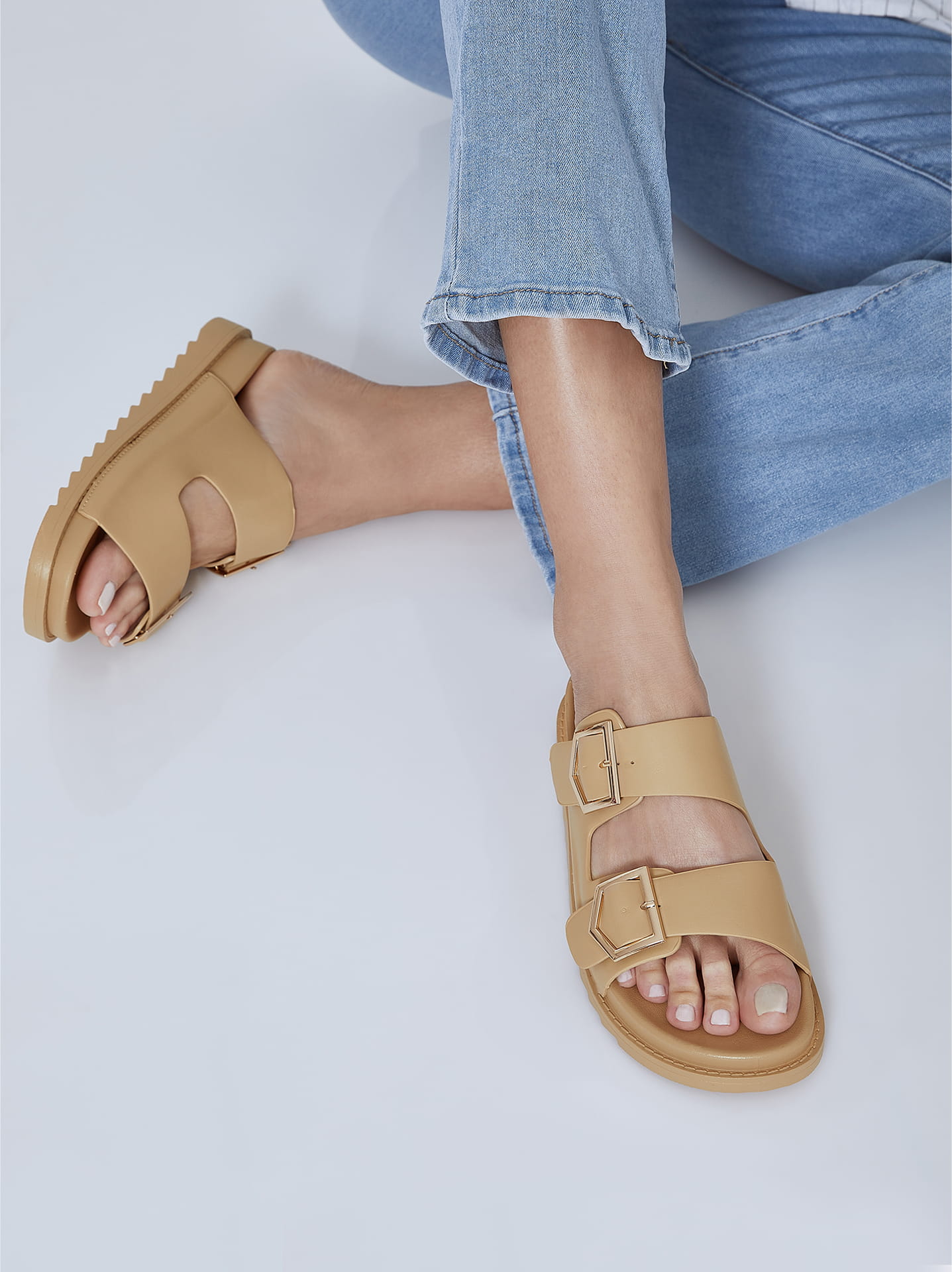 Leather effect sandals in beige