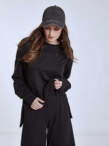 Asymmetric sweatshirt with side slits in black