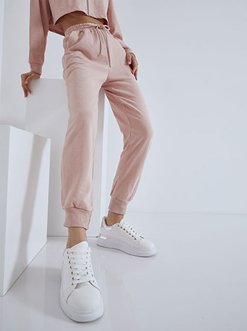 Sweatpants with elastic hemline in pink