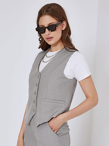 Vest with decorative pockets in grey