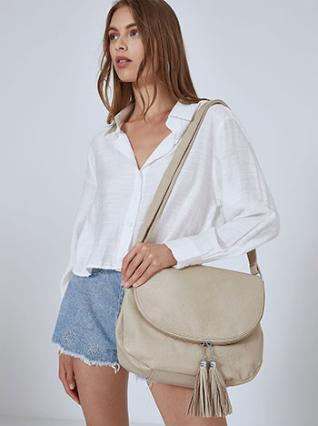Leather effect bag with tassels in beige