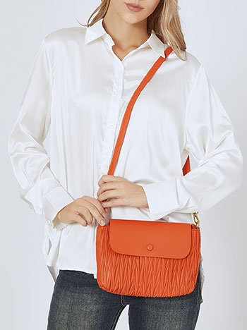 Leather effect bag with textured details in orange