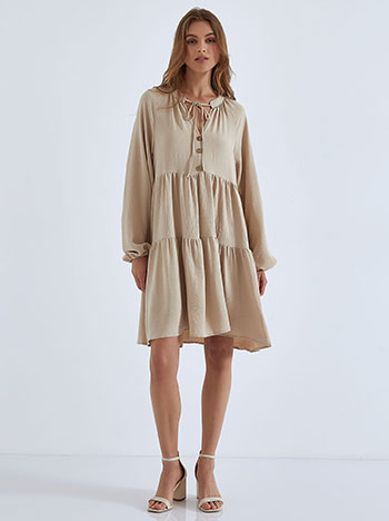 Mini dress with decorative buttons in beige