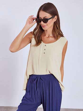 Top with decorative buttons in beige