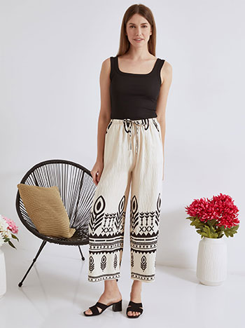 Wide leg trousers printed in light beige