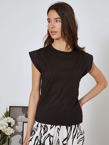 Top with broderie details in black