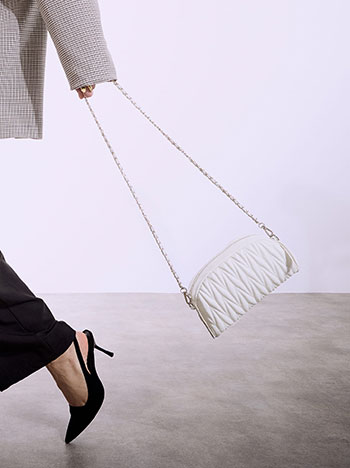 Pouch clutch bag with textured details in off white