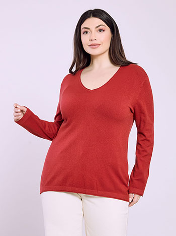 Sweater with raw details in terracota