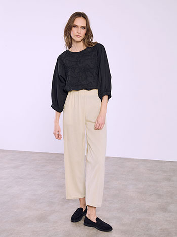 Trousers with ruffled waistband in light beige