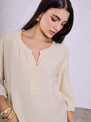 Top with buttons in beige