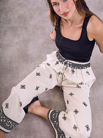 Printed wide-leg trousers in light beige