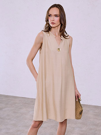 Dress with decorative button in beige