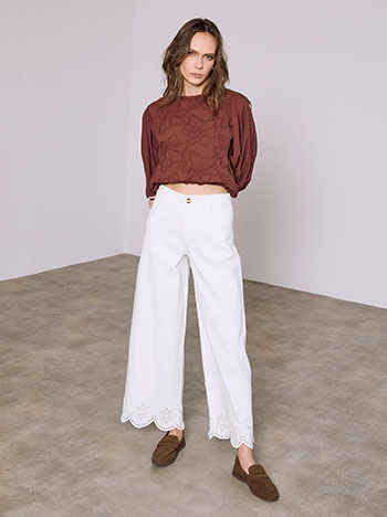 Jeans with broderie hemline in white