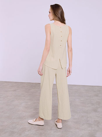 Asymmetric top and cropped trousers set in beige