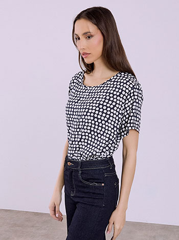 Top with polka dots in dark blue