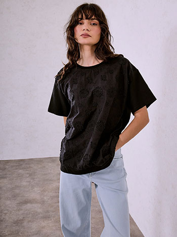 Top with embroidered details in black