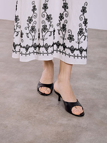 Leather effect mules in black