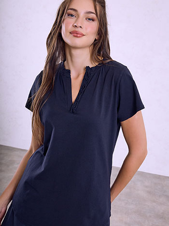 Top with ruffle detail in dark blue