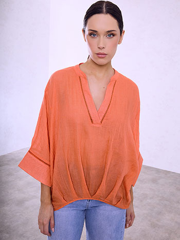 Blouse with assymetric hem in coral