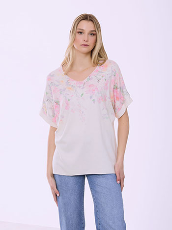 Top with floral details in light beige