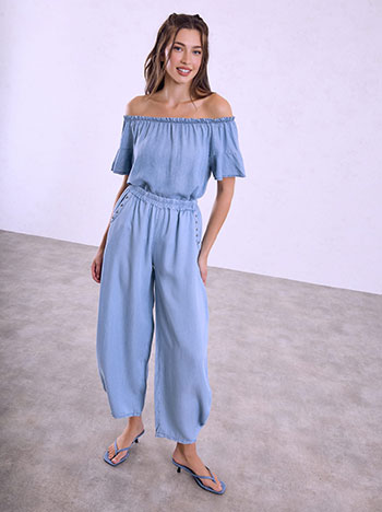 Trousers with studs on the pockets in sky blue