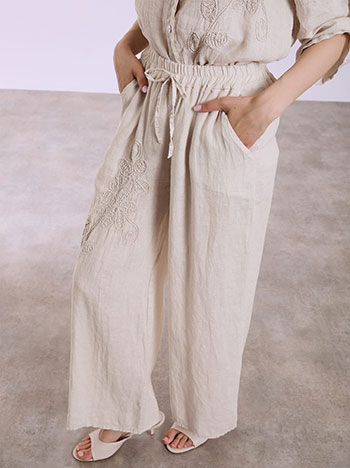 Linen trousers with broderie detail in beige