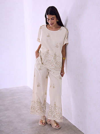 Top and wide leg trousers set in beige