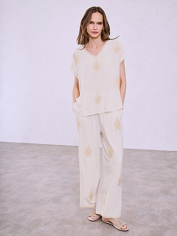 Embroidered blouse and wide-leg trousers set in light beige