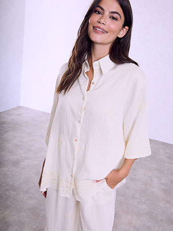 Embroidered shirt and wide-leg trousers set in light beige