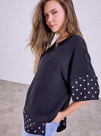 Top with polka dot details in dark blue