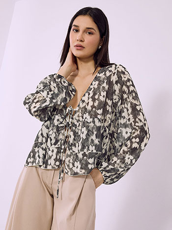 Μπλούζα εμπριμέ με βολάν σε μαύρο