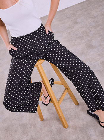 Polka dot wide leg trousers in black