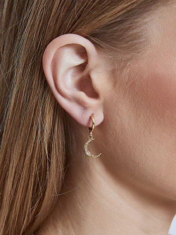 Three earrings set in gold