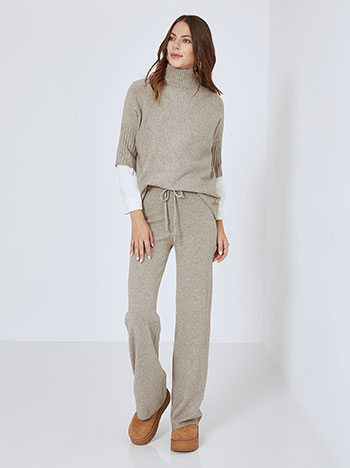 Turtleneck and wide leg trousers set knitted in light brown