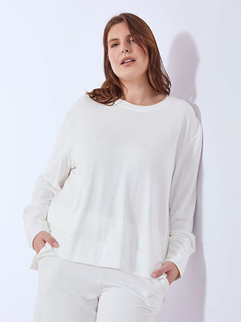 Top asymmetric with soft touch in off white