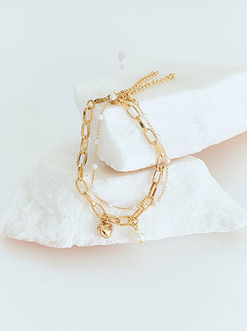 Two bracelets with pearls set in gold