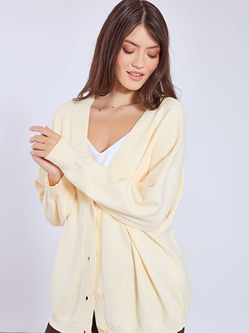 Cardigan knitted long in off white