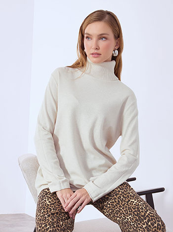 Turtleneck long with raw hemline in beige