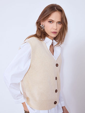 Vest knitted monochrome in beige