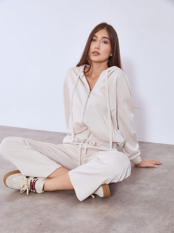 Set monochrome cardigan and trousers in beige