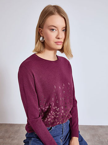 Top with textured leopard details in dark purple
