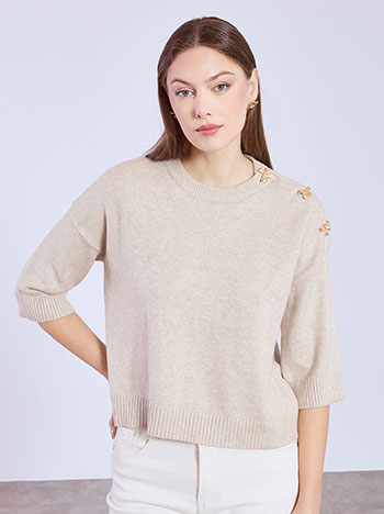 Sweater with bow buttons in beige