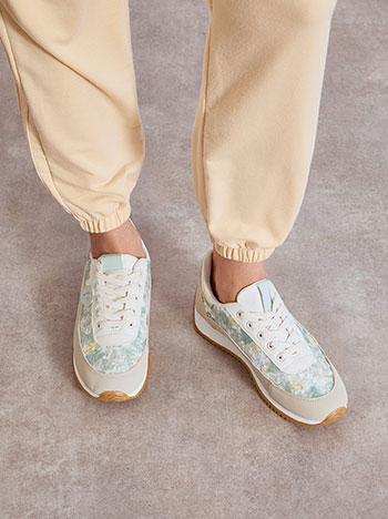 Sneakers with broderie flowers in almond green