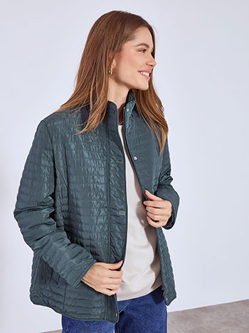 Jacket quilted with horizontal seams in teal