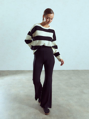 Stretch flared trousers in black