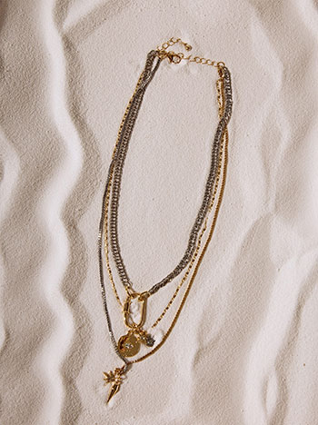 Three-row necklace with dangling details in gold silver