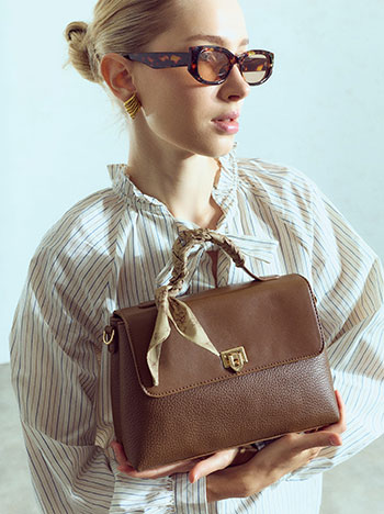 Faux leather bag with decorative scarf in brown